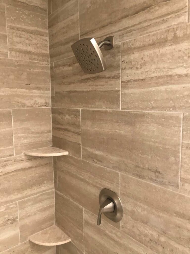 Shower valve and shower head in brushed nickel