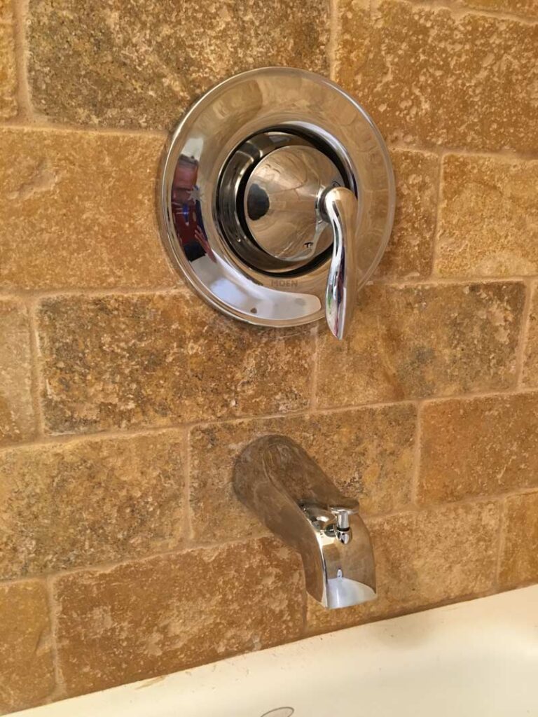 Chrome single handle tub and shower valve and tub spout