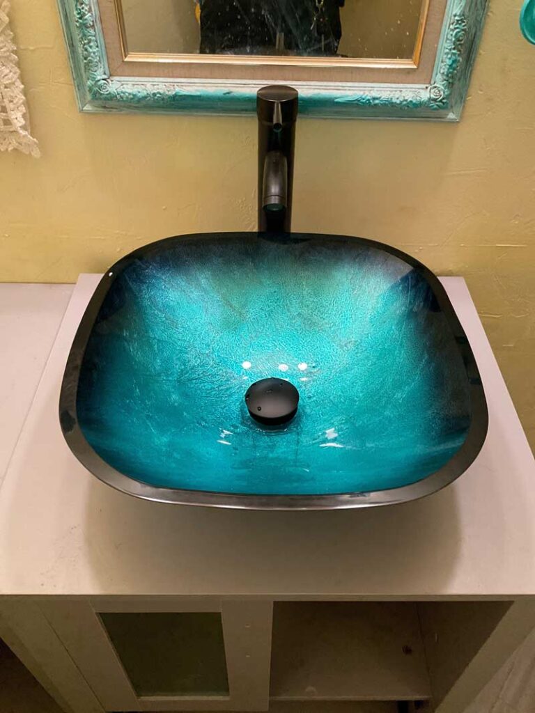 Turquoise Glass Vessel Sink with sink handle faucet