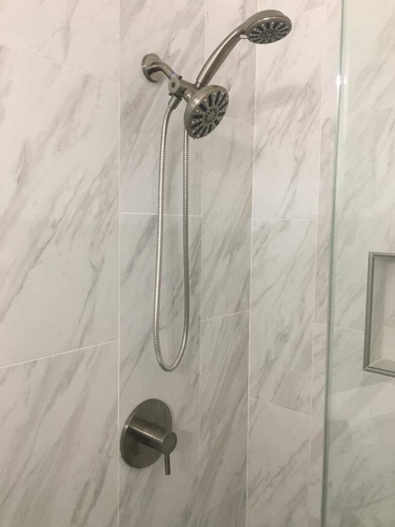 Shower valve and spray handle in stand up shower