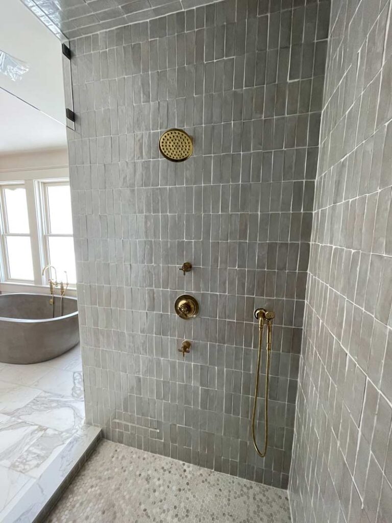 Steam shower with gold fixtures