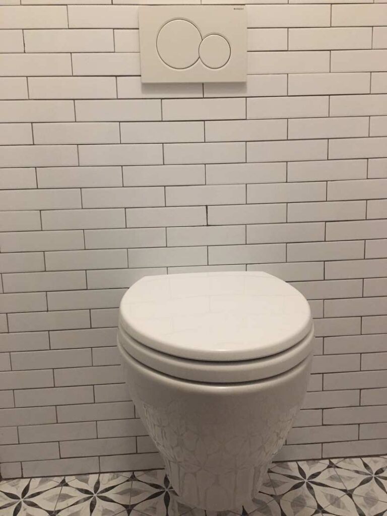 Wall mounted Toto Brand toilet